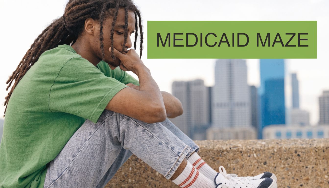 A young man with dreadlocks sitting thoughtfully against an urban city background with a Medicaid overlay.