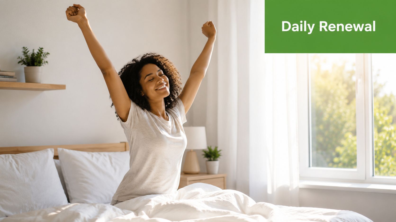 A happy woman stretching her arms in bed after a restful night of sleep in her bedroom.