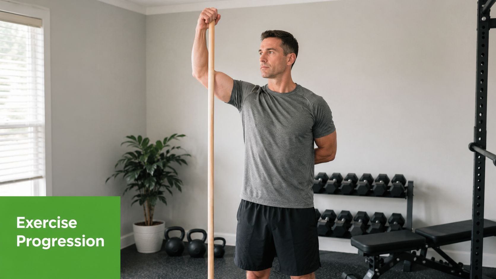 A man demonstrating an active assistive range of motion shoulder stretch with a wooden dowel rod.